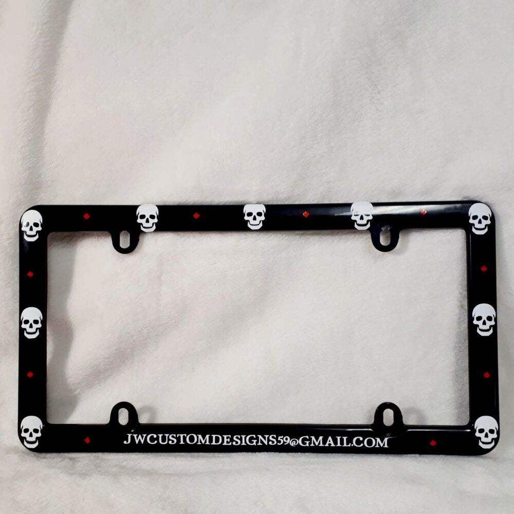 Skull's With Canada Leaves License Plate Frame